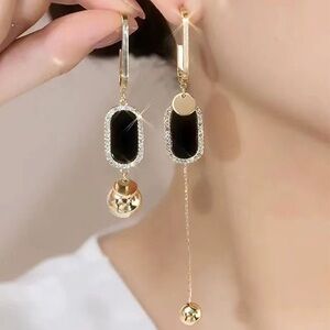 Chic Black and Gold Dangle Earrings